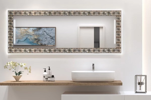Rectangular anti-fog mirror in nepal valley frame installed above a mounted countertop in Brisbane.