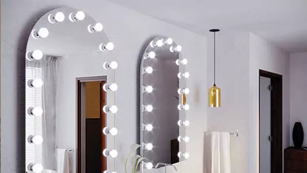 Bathroom with arch-shaped extra thin lighted mirrors, LED lights, and modern decor in Adelaide.