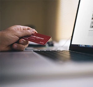 A bank card in Hobart held by a man.