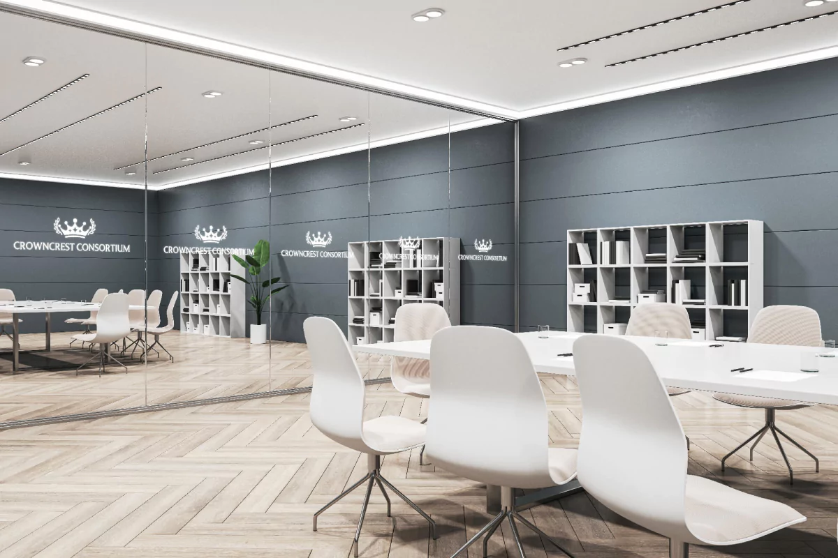 A conference room with white chairs and a bookcase, featuring a mirror with lighted logo in Hobart.