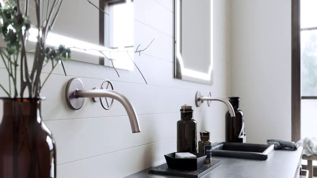 Lighted mirrors that enhance a bathroom's ambiance with a sink and countertop vase in Adelaide.