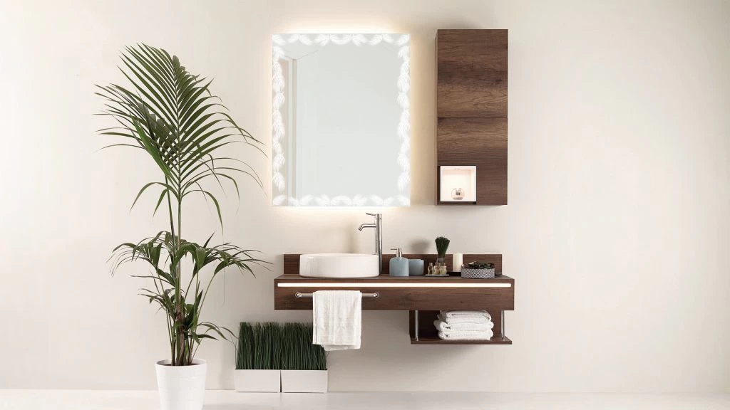 A bathroom featuring a mirror with lights around It, sink, and a touch of nature with a plant in Darwin.