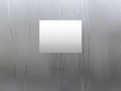 Moist mirror glass with a rectangle-shaped defogger in its center.