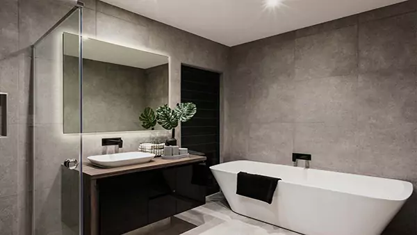 A bathroom featuring a custom lighted mirror, providing a luxurious bathing experience in Tasmania.