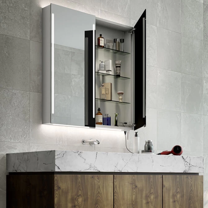 Custom cabinet with an LED mirror door installed in a tiled wall above a single sink in Queensland.