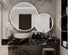 A preview of modern bathroom design with a circular custom lighted mirror in Hobart.