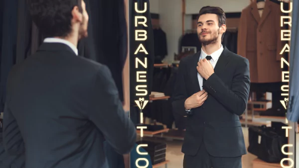 Icon of well-dressed man checking out his suit next to a mirror with glowing logo in Sydney.