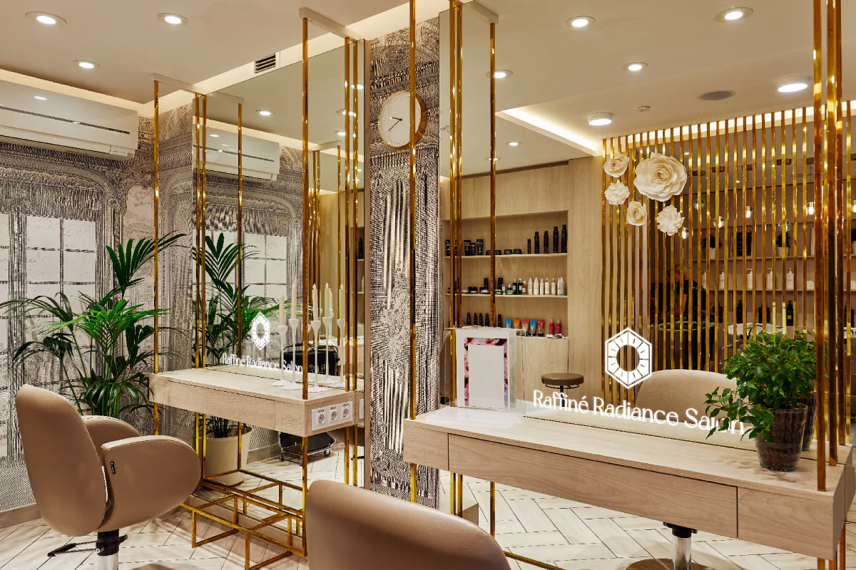 Salon interior with chairs and mirrors with logos illuminated by LED lights in Canberra.