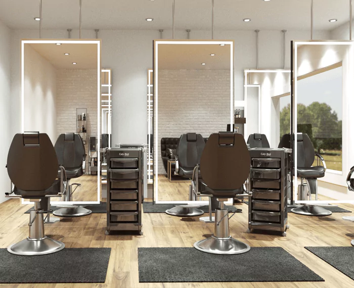 Modern salon interior with comfortable chairs and sleek illuminated mirrors in Queensland.