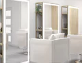 White square sofa in front of cabinet with LED salon mirrors attached thumbnail in Darwin.