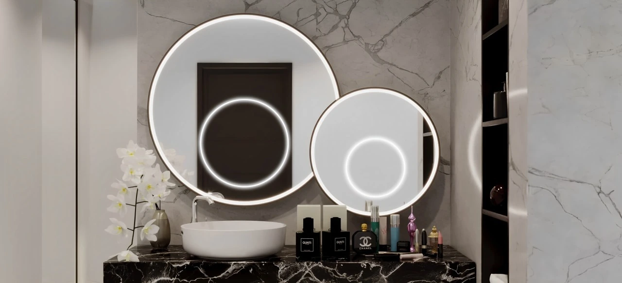 A well-lit bathroom with stylish mirrors and a sink, emphasizing a contemporary aesthetic in Lismore.