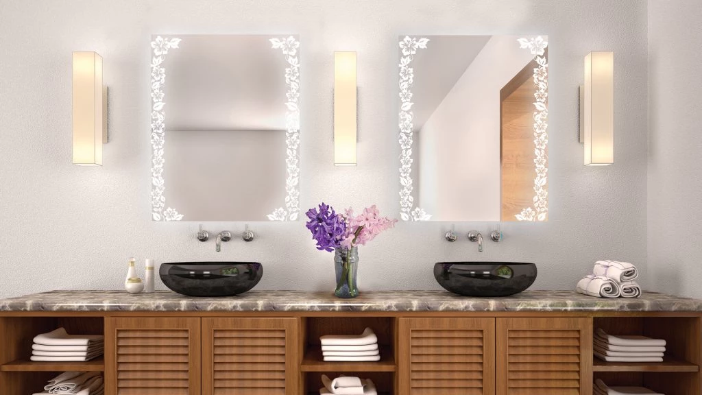 A bathroom with two mirror with lights and a sink in Queensland.