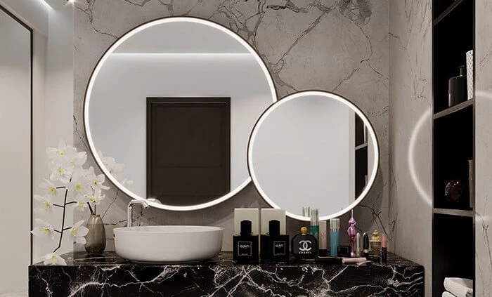 A preview of luxurious bathroom and a sleek aluminium framed mirror in Manchester.