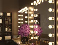 Thumbnail of a double studio vanity with Grand Mirrors Hollywood and purple flowers in Brisbane.