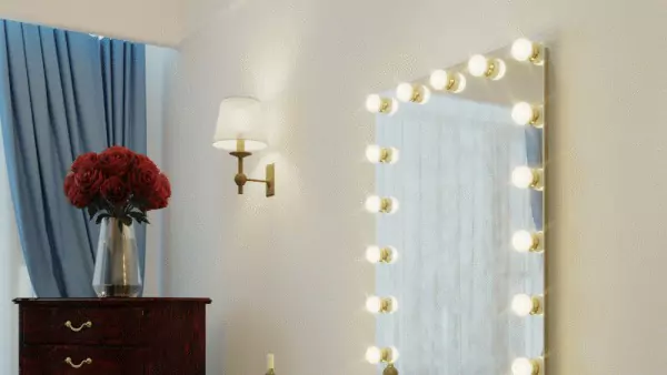 A joyful woman looks at her reflection in a Grand Mirrors Hollywood mirror in Darwin.