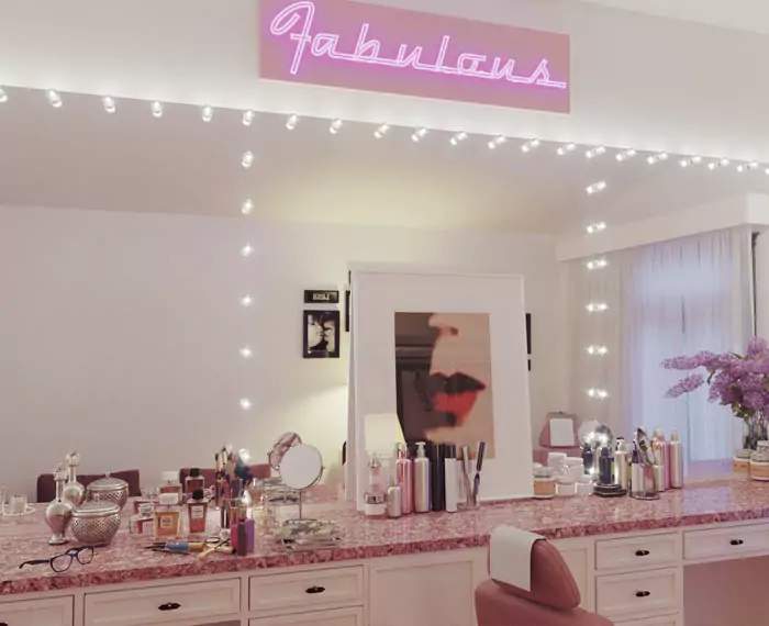 Salon LED mirror mounted on white wall in front of a pink themed marble vanity desk in Adelaide.