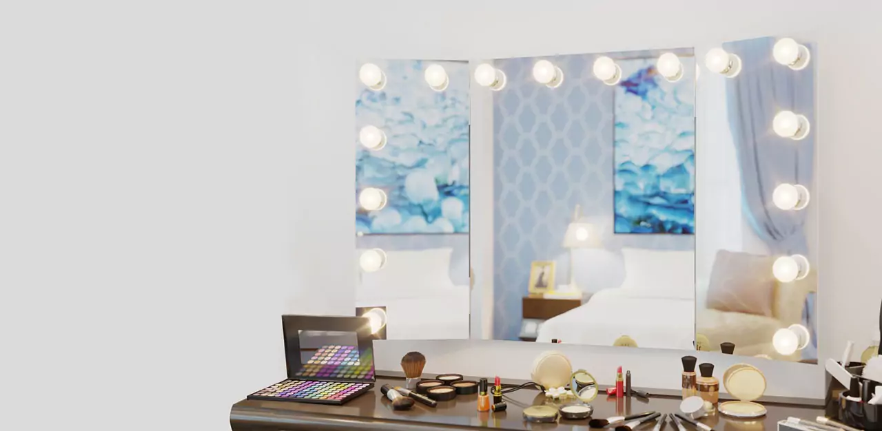 Vanity setup with a made to order hollywood mirror, LED lights, and various makeup products in Victoria.