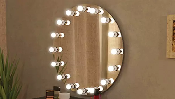 Round hollywood lighted mirror with surrounding bulb lights in Tasmania.