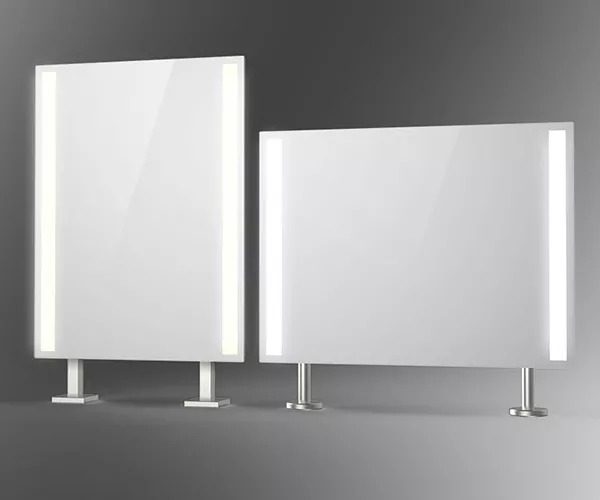 Rectangular shaped stainless steel countertop-mounted mirrors with lights strips in Queensland.