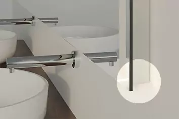 Extra-thin lighted mirror with two silver faucets and a white washbowl in Sydney.