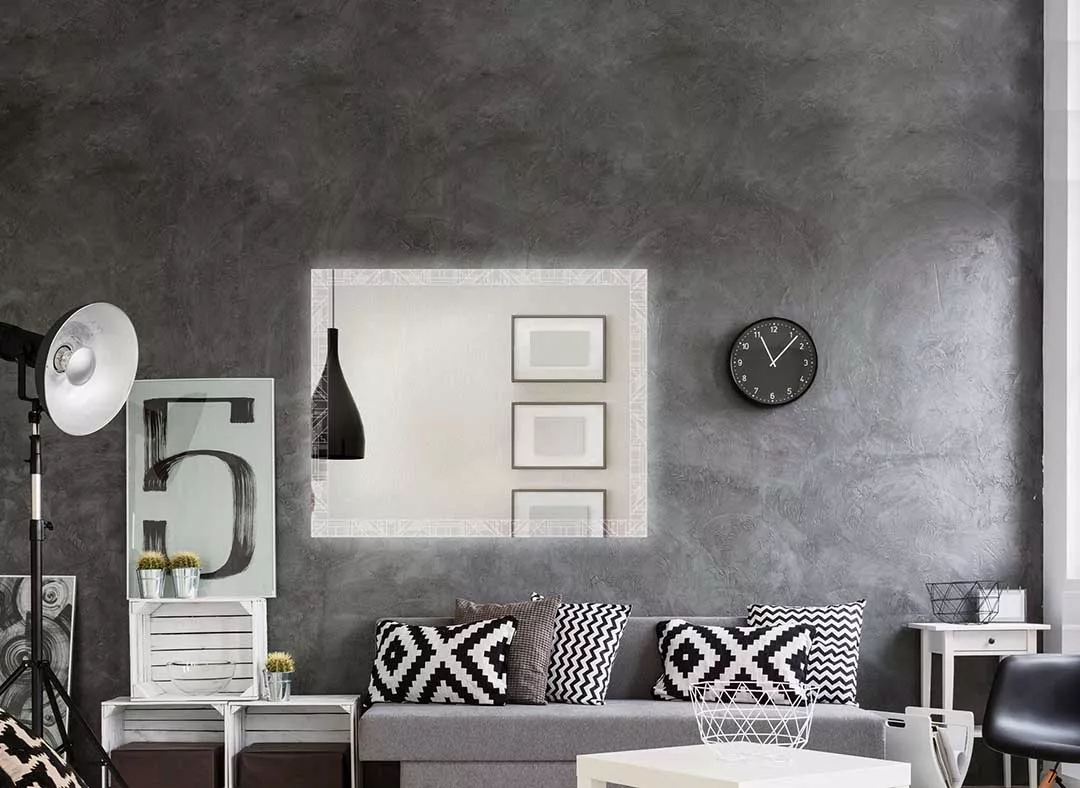 Gray wall and elegant black furniture, perfect for a lighted mirror in Sydney.