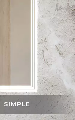 An elegant bathroom featuring a mirror with lights and a ceramic sink in Sydney.