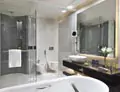 A preview of a bathroom featuring a bespoke backlit mirror in Newcastle.