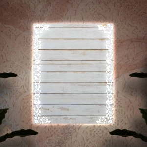 A tropical vibe frame backlit mirror set on a pastel brown wall.